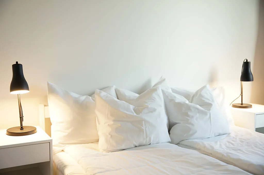 Bed with white linen